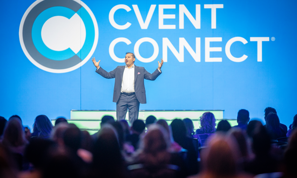 Reggie Haw, president of Cvent, speaks to a crowd at Cvent Connect in Washington, D.C.